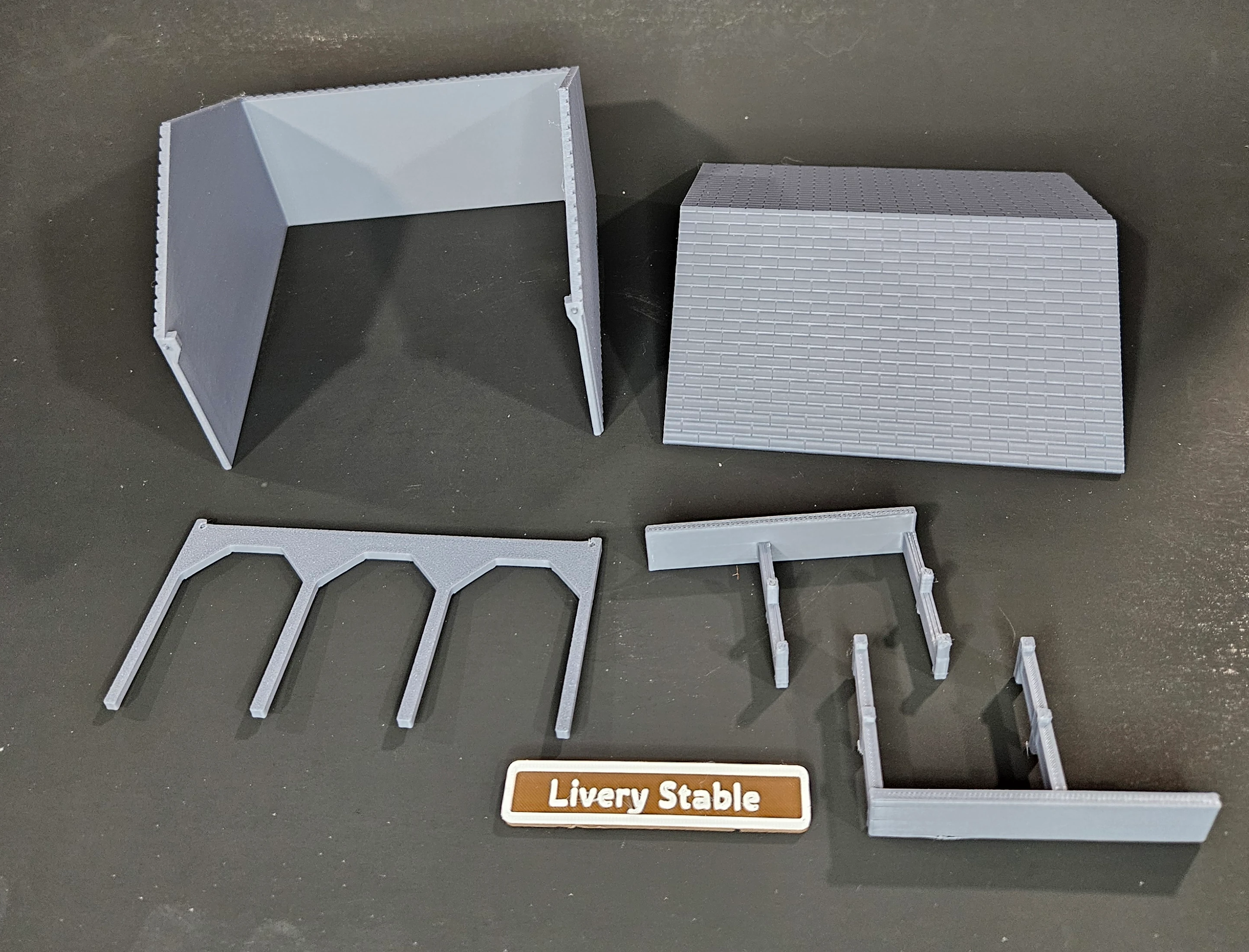 Parts included with the HO scale livery stable kit