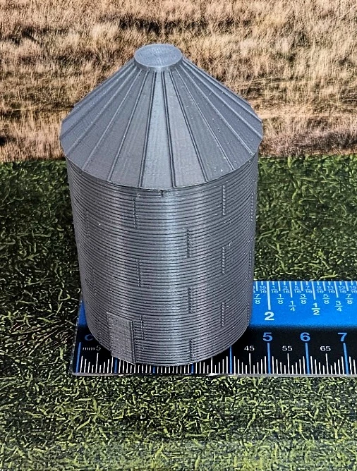 N scale grain silos displayed together in a model railroad scene