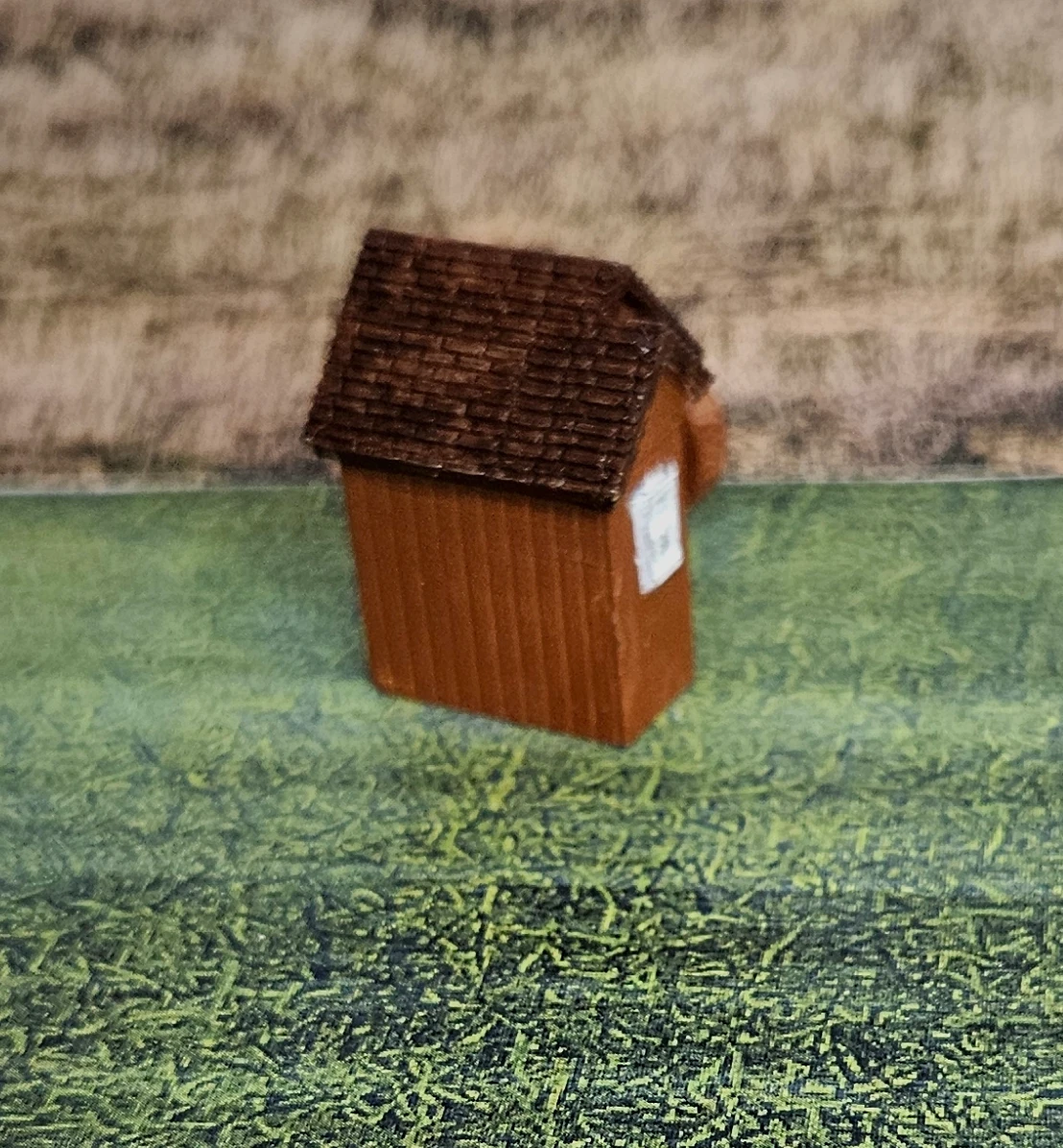 Detailed roof and stone-style waterwheel supports
