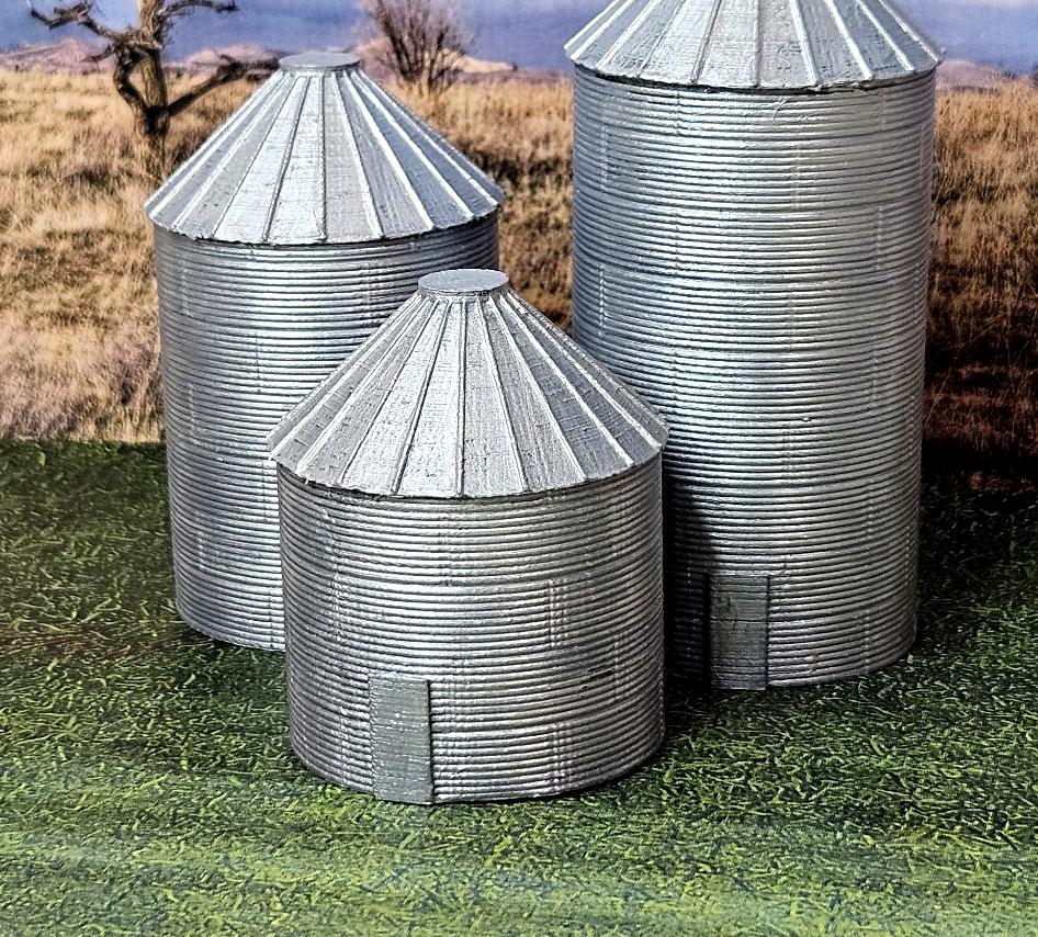 Painted example of the three N scale grain silos