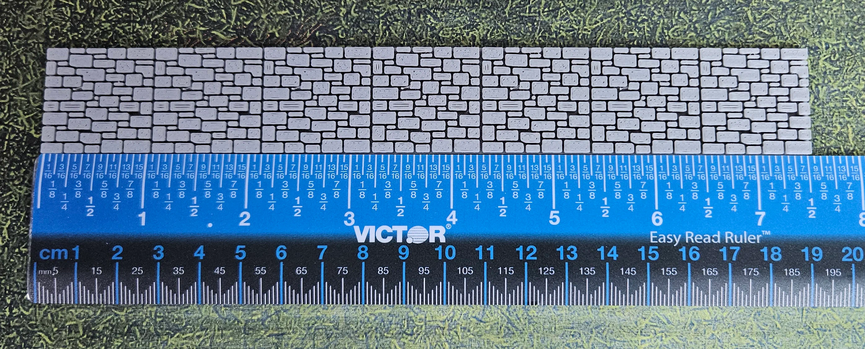 Solid gray HO scale stone wall measured at approximately 190 millimeters long