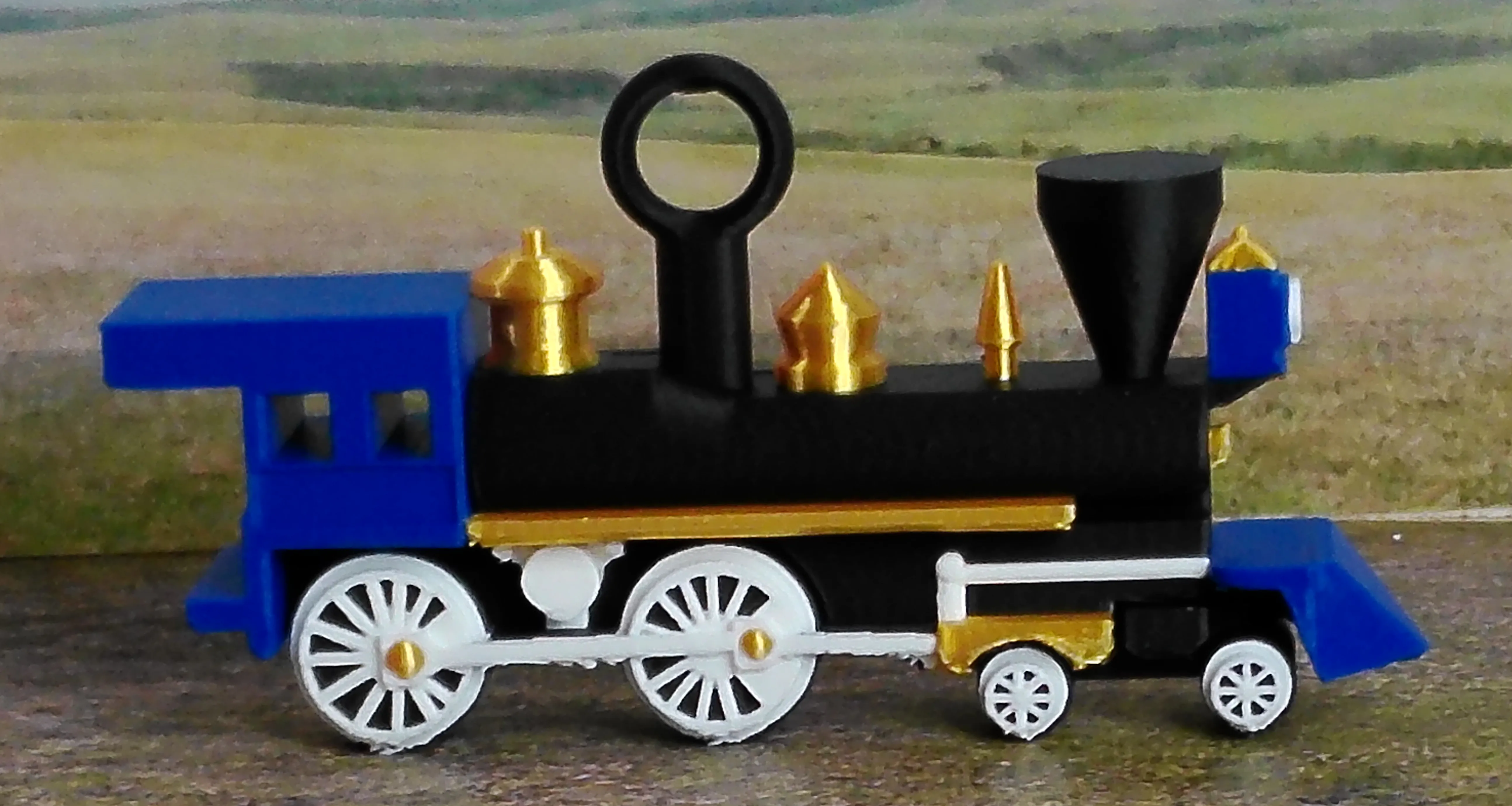 Blue steam locomotive Christmas ornament viewed from the side